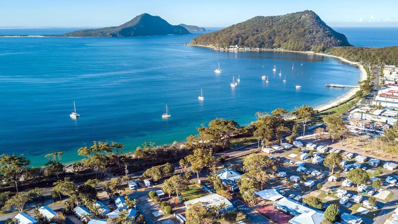 Bay with boats and coastal town