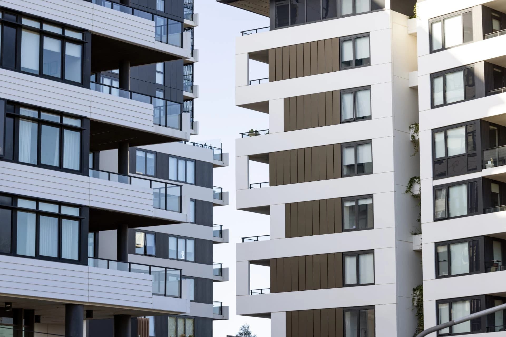 Modern apartment buildings representing commercial property management