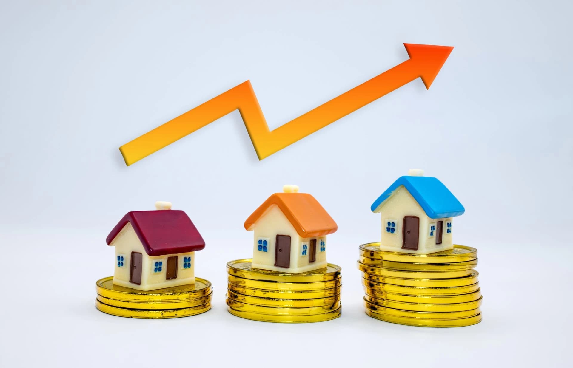 Miniature houses on coins with an increasing graph