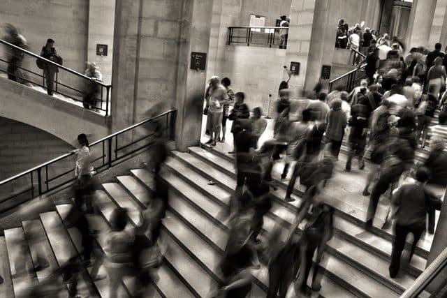 Blurred crowd on a grand staircase.