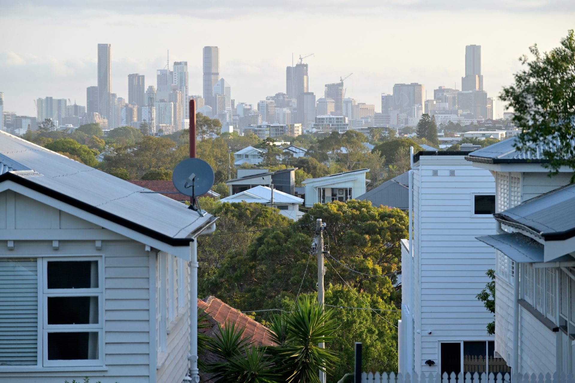 Residential houses against Brisbane City skyline in Queensland Australia Brisbane property market